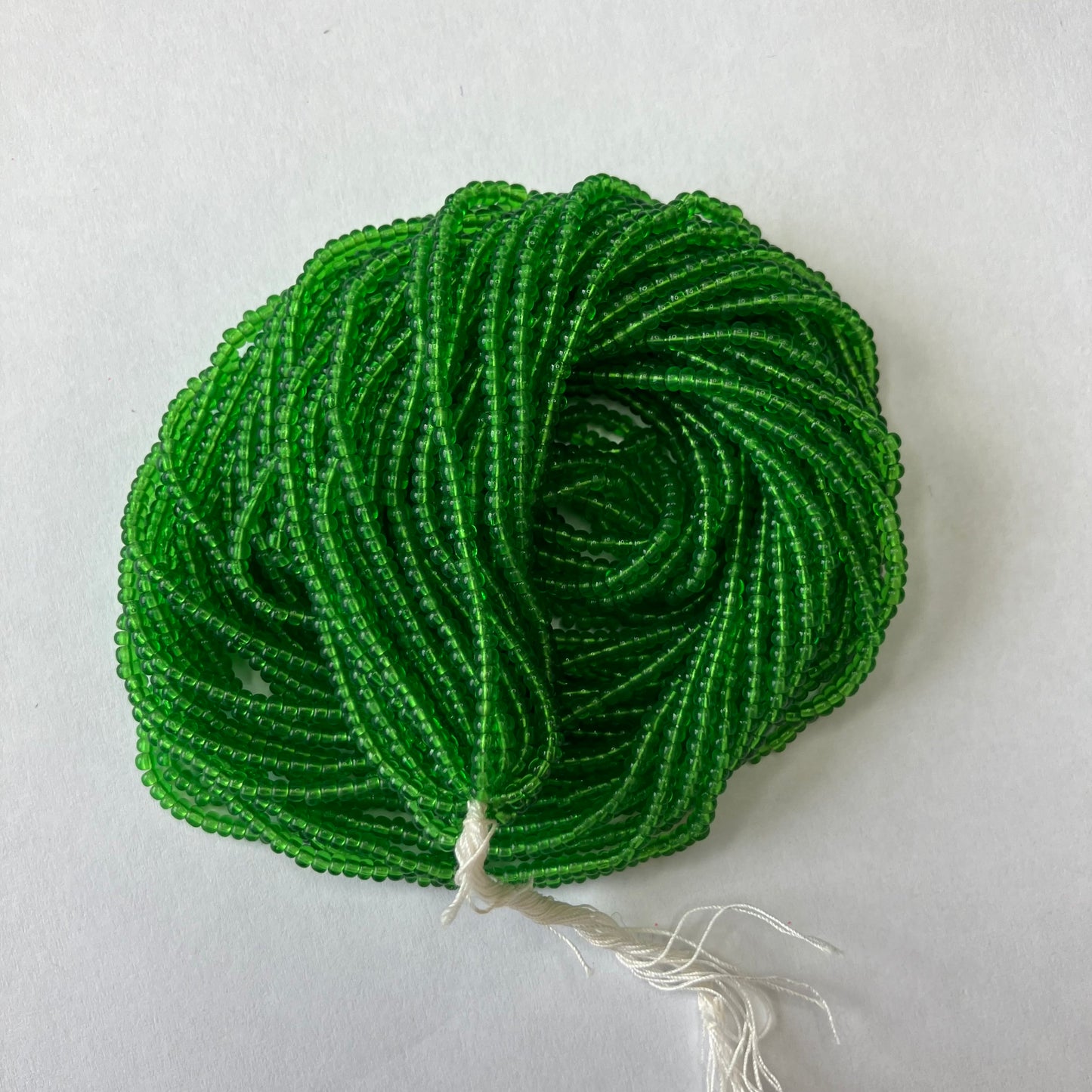 11/0 Transparent Green Seed Beads - Hank