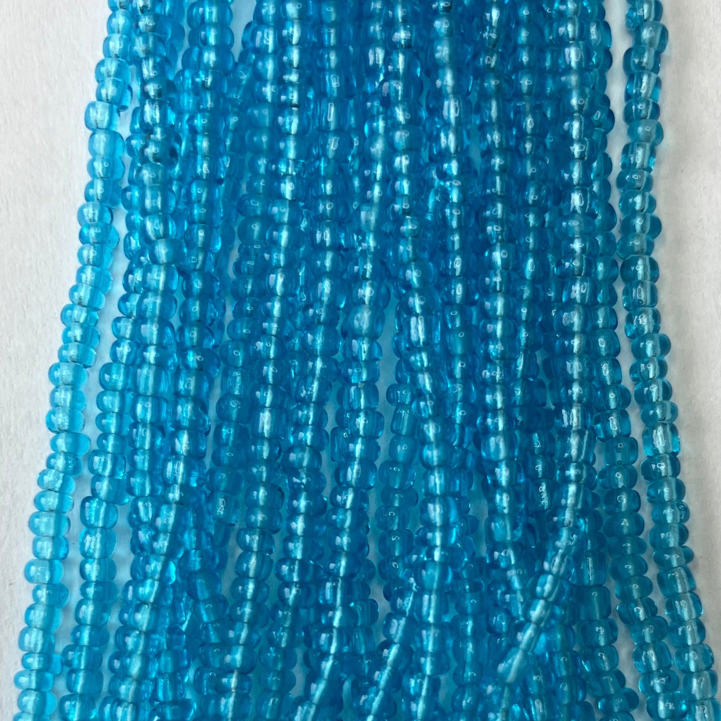 11/0 Transparent Sky Blue Seed Beads – Hank