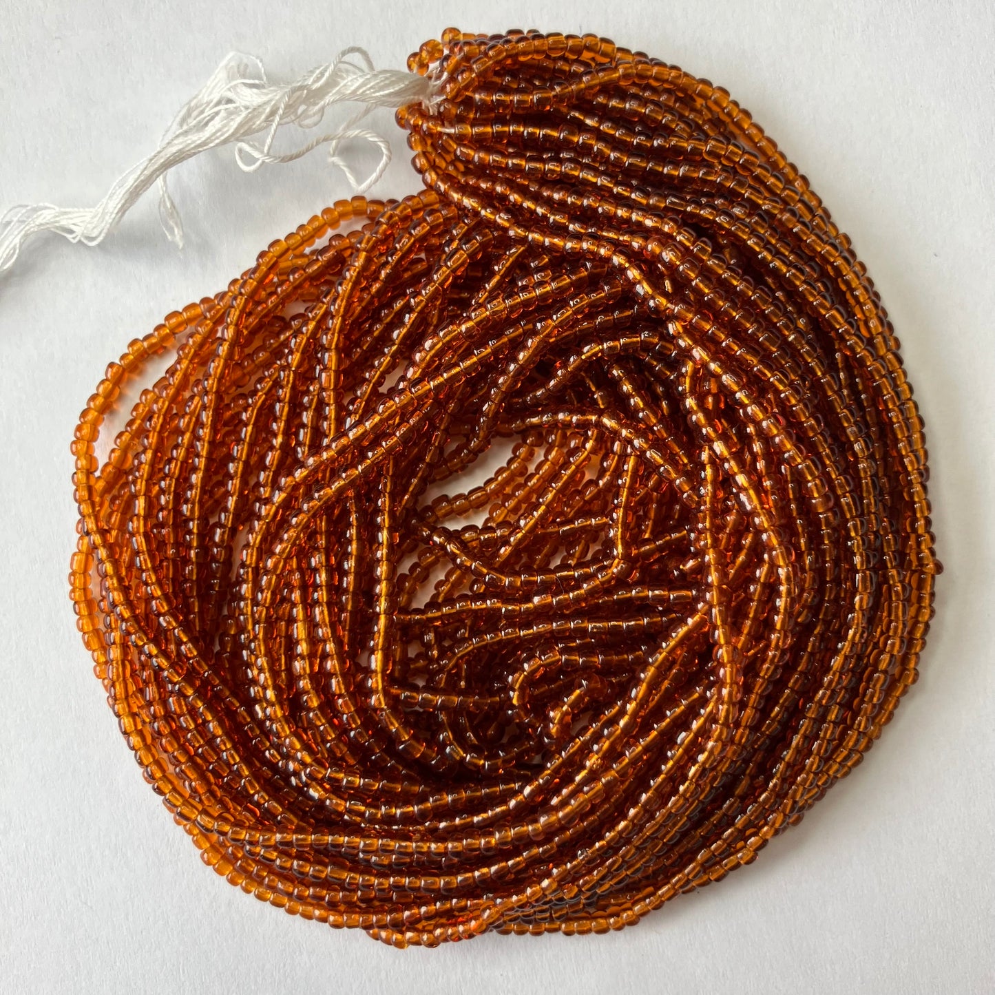 11/0 Transparent Light Brown Seed Beads – Hank