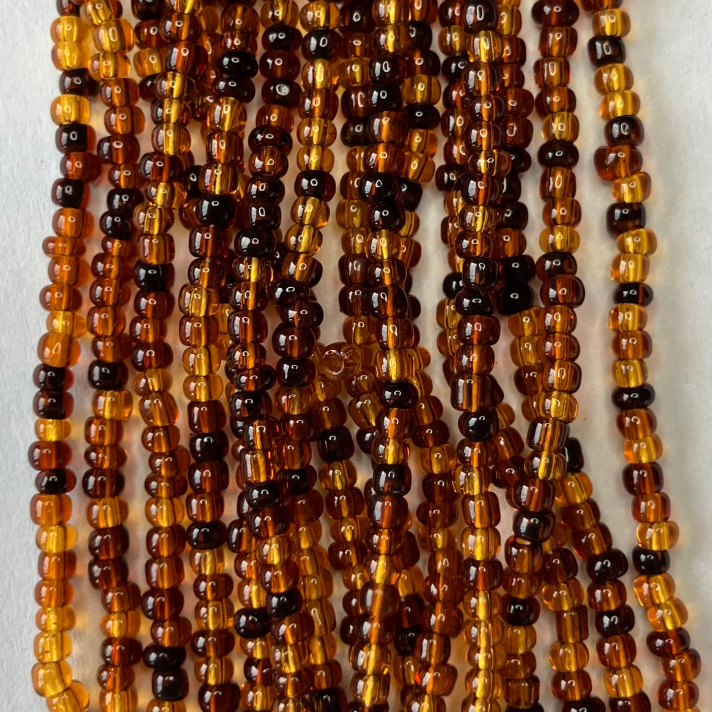 11/0 Transparent Brown Bead Mix – Hank