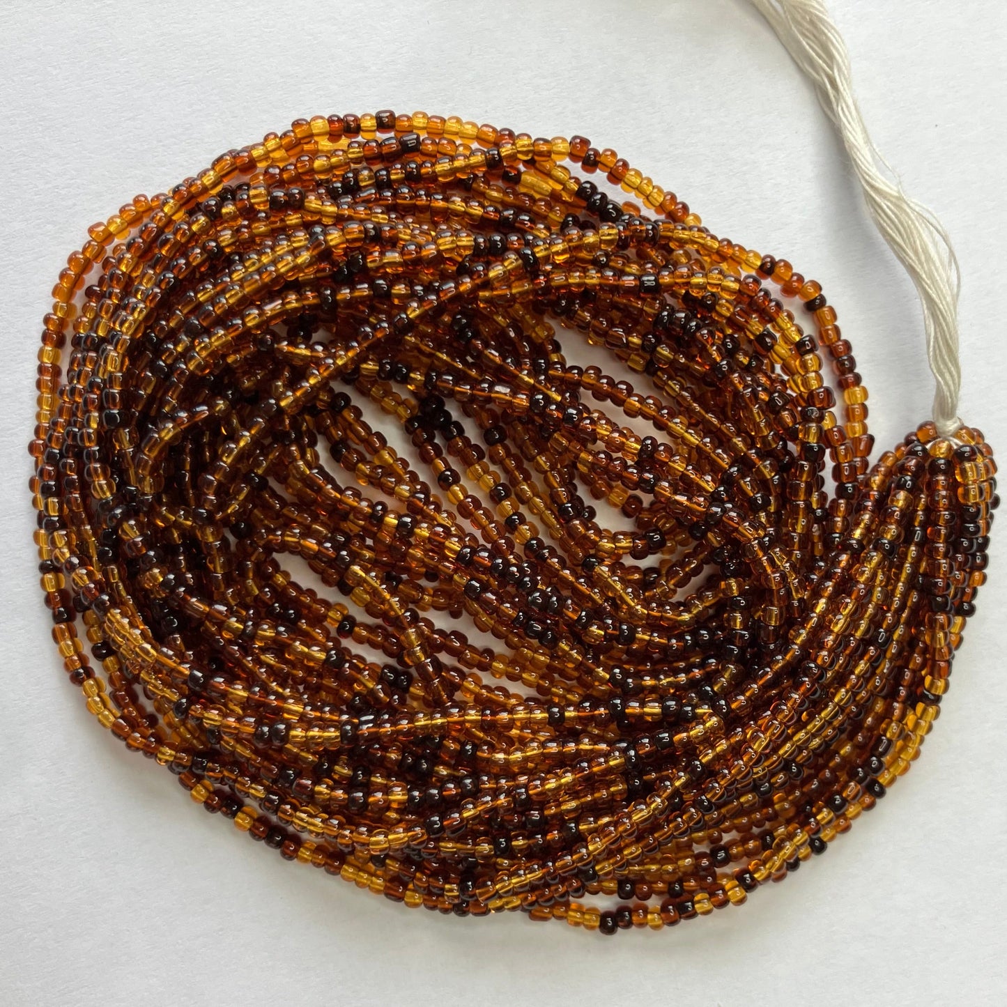 11/0 Transparent Brown Bead Mix – Hank